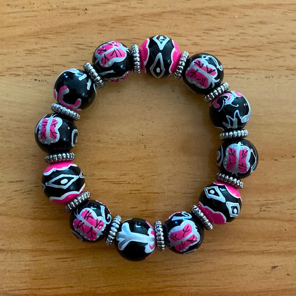 Angela Moore hand painted beads. Black/pink/white/gray colors with Butterflies.
